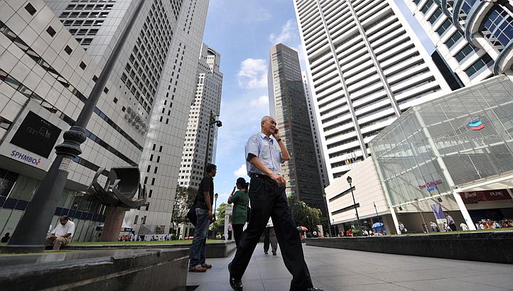 Singapore cut wages