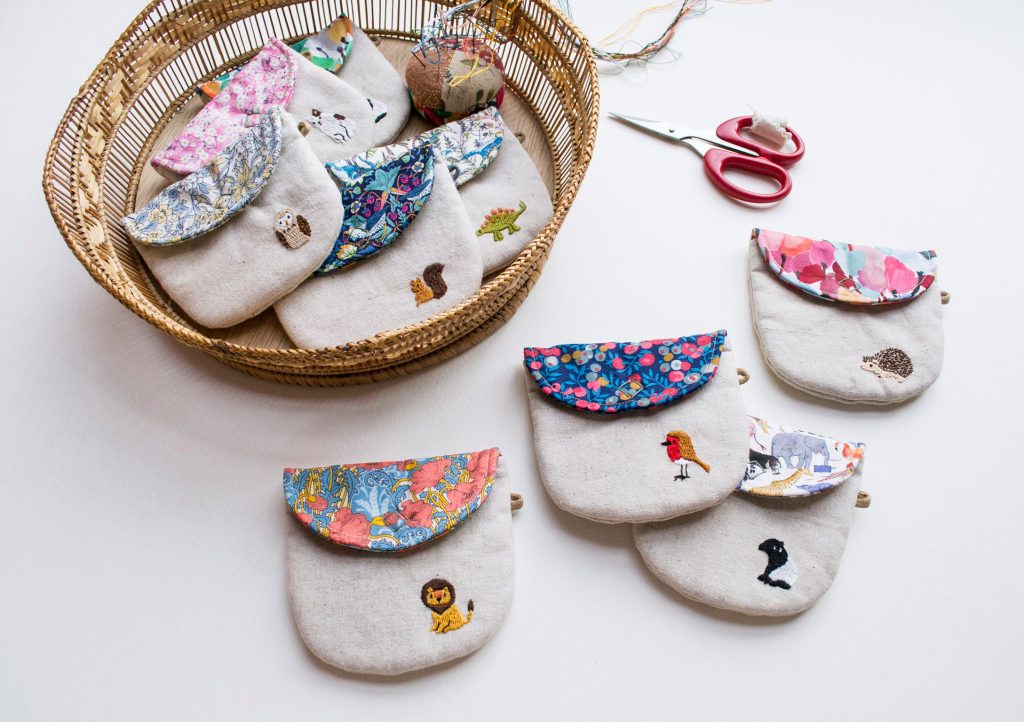 embroidered pouches by Momshoo
