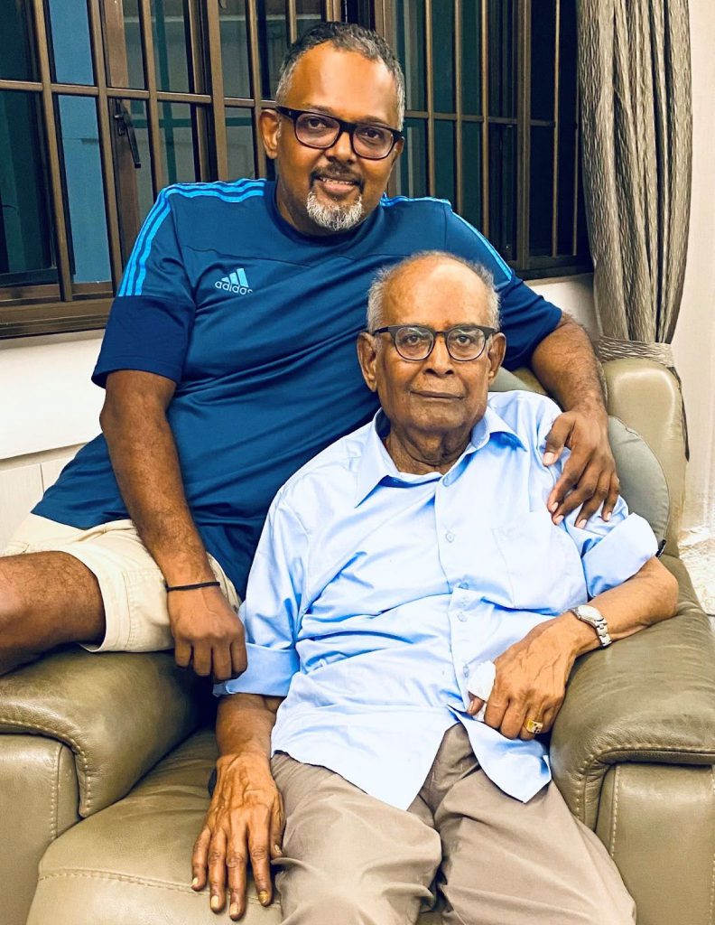 Senthil M., the founder of medical device company Uroclips, together with his late father.