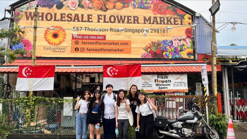 Shayner Chioh together with some colleagues at the Far East Flora Market retail outlet.
